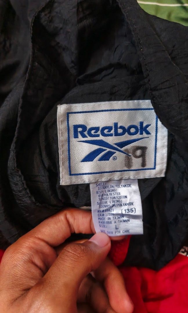 Vintage Reebok Track jacket mid 90s (Category: Coats, Jackets and Outerwear) located in Zamboanga. Submitted by crazy_findss (Listing ID 1458537697, Image 3). Description: 24 inch width 28 inch length 22 inch sleeve length No issue Flawless Nylon outer shell Cotton inner Working zippers Add sf Location:Zamboanga City, Mindanao.