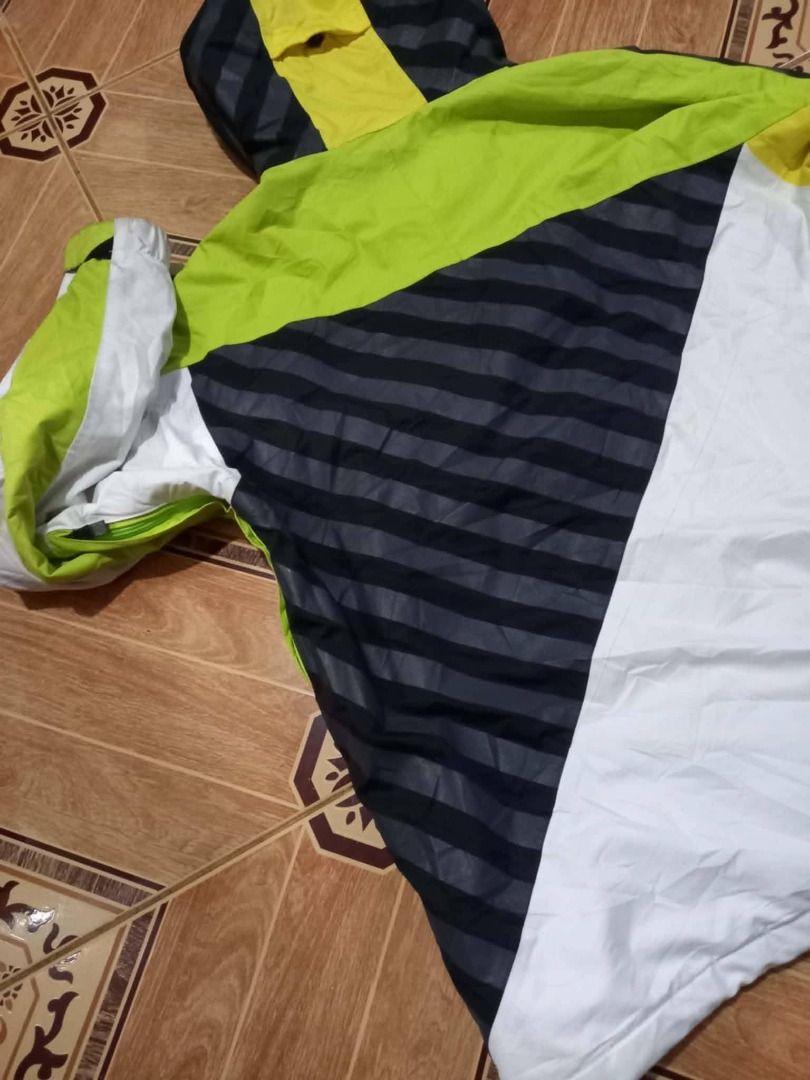 Volcom Snowboard Jacket XL (Category: Coats, Jackets and Outerwear) located in Baguio. Submitted by jonandaya (Listing ID 1458685104, Image 3). Description: - Volcom Snowboard Jacket - Size: XL - Design: Bold color block with green, white, and black stripes - Interior Lining: Vibrant purple with diagonal stripes - Closure: Zipper with branded pull tab - Perfect for: Snowboarding or stylish winter wear.