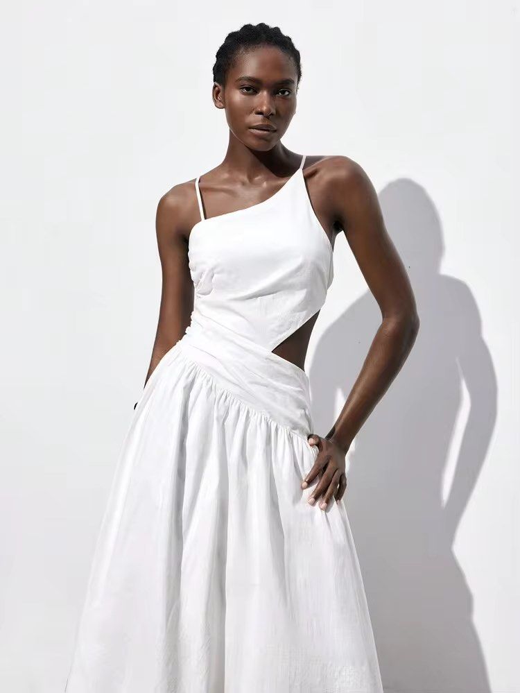White Asymmetrical Cut-out Maxi Dress (Category: Dresses) located in Legazpi City. Submitted by golden_potatoe (Listing ID 1458509720, Image 1). Description: Can Fit up to medium (adjustable back).