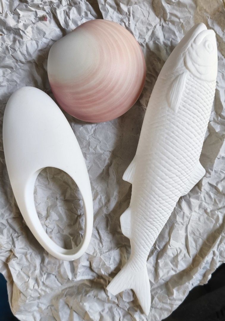 White Fish, Pink Shell, and Oval Ceramic Figurines (Category: Other Home Decor) located in Caloocan City. Submitted by majehjembo8 (Listing ID 1458587587, Image 1). Description: - Set of 3 unique ceramic decor pieces. - Features a white ceramic fish with intricate scale detailing. - Includes a charming pink and white shell-shaped dish. - Comes with a smooth, elegant white oval object (ideal as a ring holder or decorative accent). - Adds a touch o