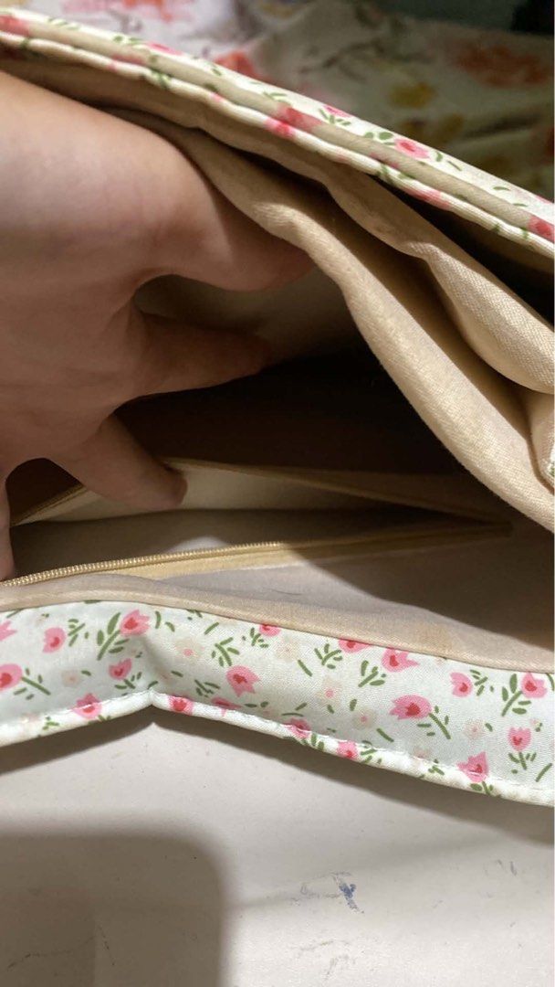 White Floral Backpack (Category: Backpacks) located in Manila. Submitted by annbrnld (Listing ID 1458614230, Image 3). Description: - Cute white backpack with a light blue floral print. - Two adjustable buckle straps on the front flap. - Interior pockets for organization. - Ideal for school or casual outings. - Shows some minor marks on the white flap..