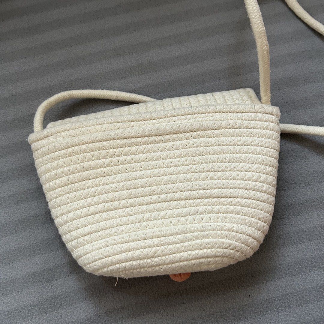 White Woven Crossbody Bag (Category: Cross-body Bags) located in San Pedro. Submitted by aa_jaye (Listing ID 1458645590, Image 3). Description: ⊹ lightly used ⊹ in perfect condition check out my listings for more items! ▫️payment: gcash / bank transfer ▫️delivery: j&t / lalamove (can ship from bgc or san pedro, laguna).