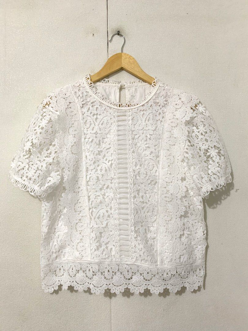 Women white lace blouse (Category: Blouses) located in Calamba. Submitted by melaicas (Listing ID 1458618129, Image 1). Description: Armpit laid flat-19.5 inches Length-24 inches .