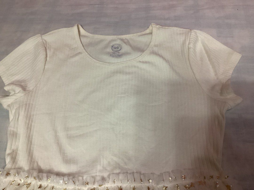 Wonder Nation Dress (Category: Dresses) located in Davao. Submitted by ferdipt (Listing ID 1458615433, Image 2). Description: XXL(18) Made in Cambodia L:35 inches This is a Wonder Nation Girls Short Sleeve Tutu Dress featuring a ribbed ivory bodice and a mesh tulle skirt covered in metallic gold foil stars..