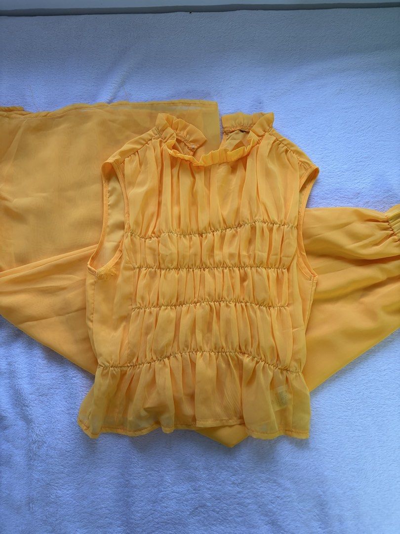 Yellow Chiffon Ruched Top & Wide Leg Pants Set (Category: Sets or Coordinates) located in Antipolo. Submitted by trinannounce (Listing ID 1458599148, Image 3). Description: - Bright yellow chiffon set - Sleeveless top with ruched front and high neckline - Matching wide-leg pants with elastic waistband - Lightweight and flowy material - Great for a pop of color - Worn once for an event.