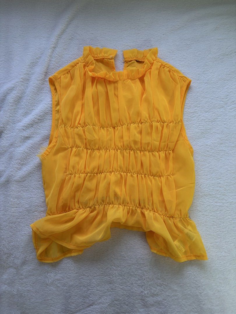 Yellow Chiffon Ruched Top & Wide Leg Pants Set (Category: Sets or Coordinates) located in Antipolo. Submitted by trinannounce (Listing ID 1458599148, Image 1). Description: - Bright yellow chiffon set - Sleeveless top with ruched front and high neckline - Matching wide-leg pants with elastic waistband - Lightweight and flowy material - Great for a pop of color - Worn once for an event.