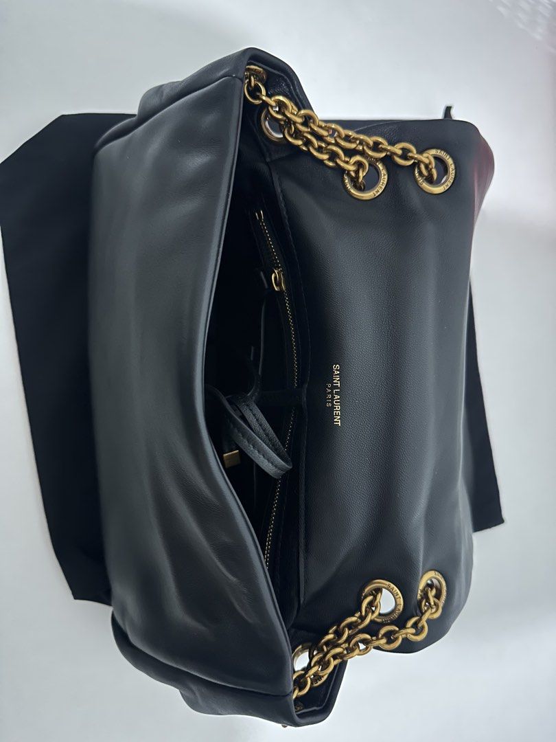 YSL Black Leather Puffer Chain Bag (Category: Luxury Bags & Wallets) located in Manila. Submitted by formerly_xoxo.waldorf (Listing ID 1458643096, Image 2). Description: - Yves Saint Laurent black leather puffer bag (11 x 7.5 inches) - Quilted design - Gold chain strap - Comes with dust bag - perfect for day or night use !!.