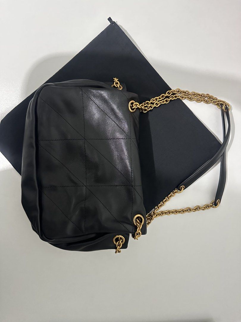 YSL Black Leather Puffer Chain Bag (Category: Luxury Bags & Wallets) located in Manila. Submitted by formerly_xoxo.waldorf (Listing ID 1458643096, Image 3). Description: - Yves Saint Laurent black leather puffer bag (11 x 7.5 inches) - Quilted design - Gold chain strap - Comes with dust bag - perfect for day or night use !!.