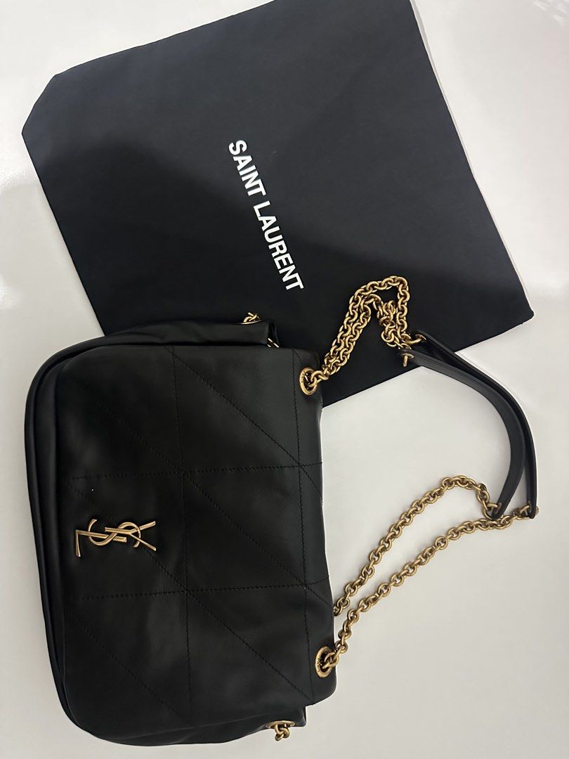 YSL Black Leather Puffer Chain Bag (Category: Luxury Bags & Wallets) located in Manila. Submitted by formerly_xoxo.waldorf (Listing ID 1458643096, Image 1). Description: - Yves Saint Laurent black leather puffer bag (11 x 7.5 inches) - Quilted design - Gold chain strap - Comes with dust bag - perfect for day or night use !!.
