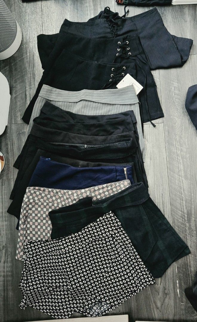 Zara Basic Skirts Bundle - Various Patterns & Styles (Category: Skirts) located in Singapore. Submitted by simplyjoysg (Listing ID 1458565612, Image 1). Description: If you love skorts as much as I do.. you know how versatile this looks is... - Bundle of 13 pieces of Basic skorts, 2 from Zara - Includes: black lace-up, grey pinstripe skort, navy textured, patterned skorts. - Selling as a complete lot. Self collection 779087..