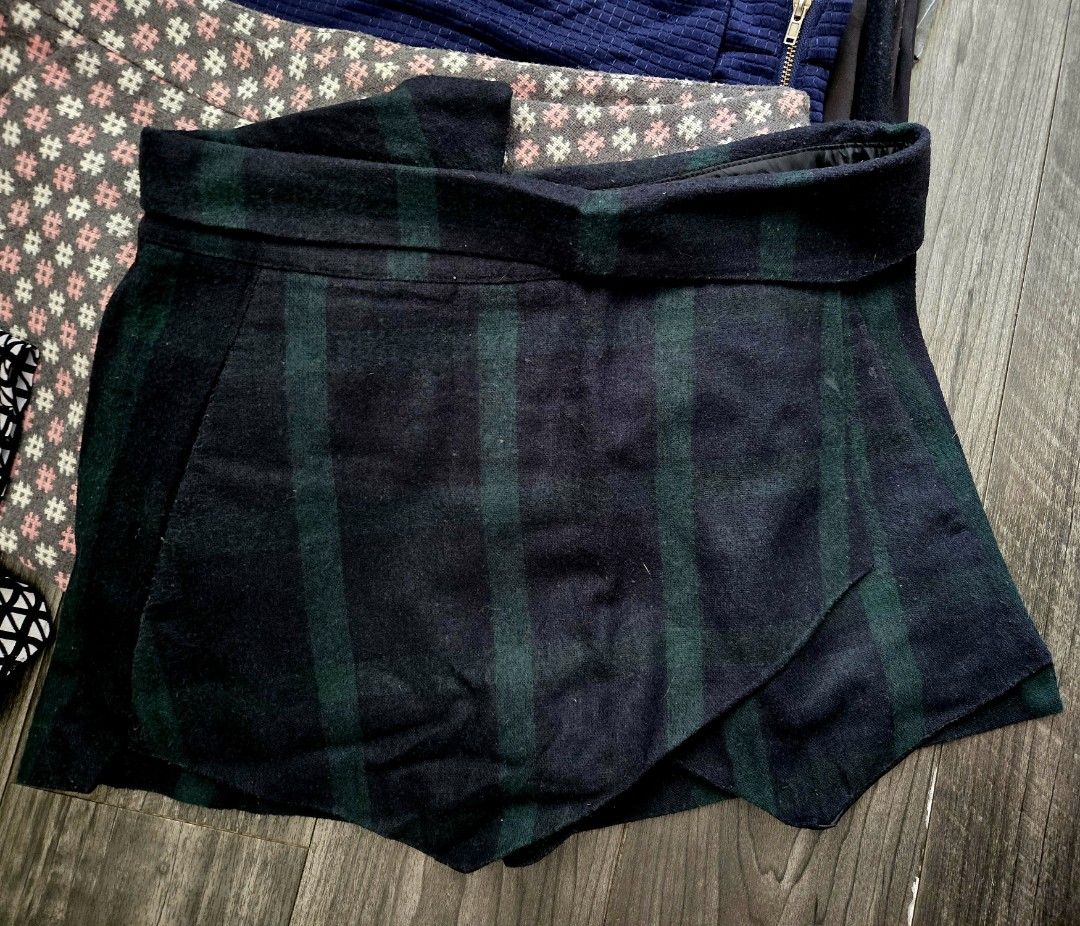 Zara Basic Skirts Bundle - Various Patterns & Styles (Category: Skirts) located in Singapore. Submitted by simplyjoysg (Listing ID 1458565612, Image 2). Description: If you love skorts as much as I do.. you know how versatile this looks is... - Bundle of 13 pieces of Basic skorts, 2 from Zara - Includes: black lace-up, grey pinstripe skort, navy textured, patterned skorts. - Selling as a complete lot. Self collection 779087..
