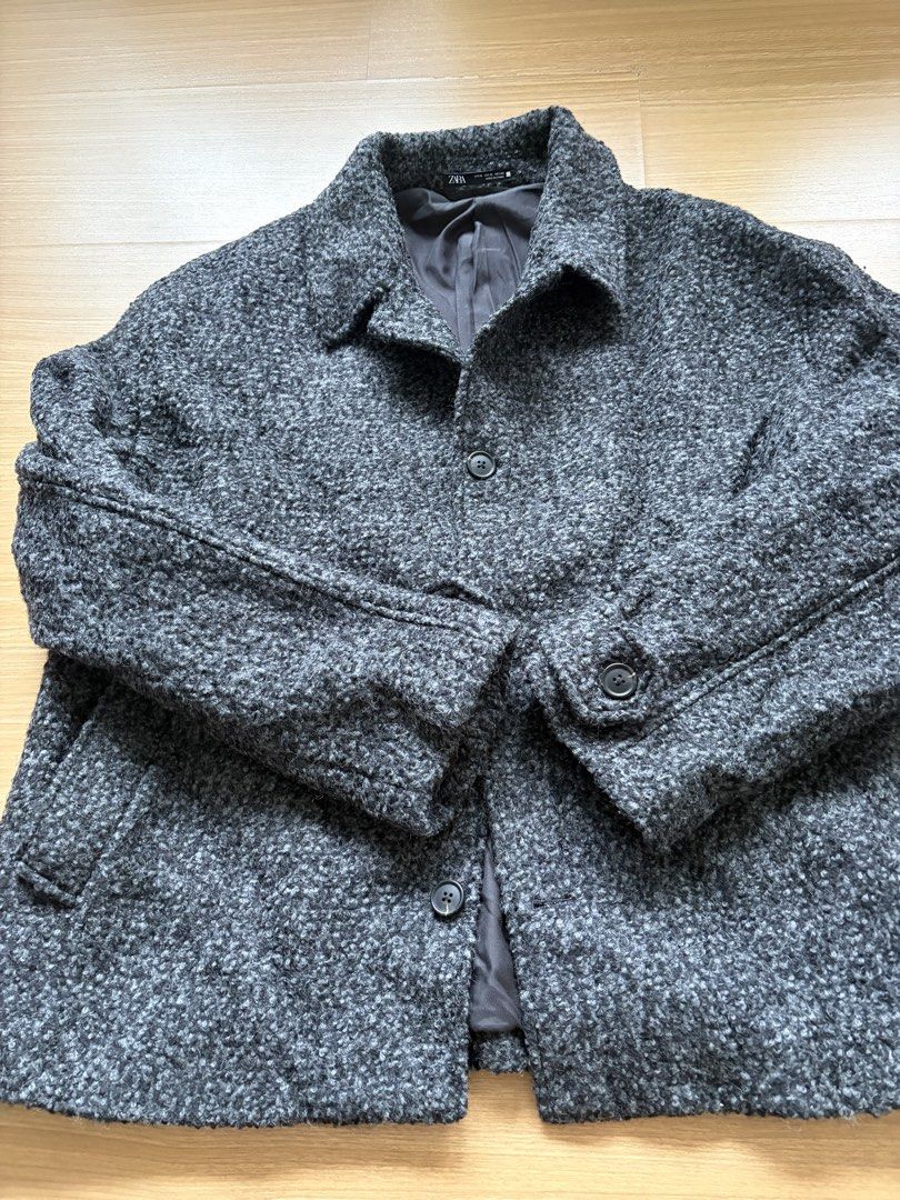 ZARA Man Wool Textured Button-Up Coat (Category: Coats, Jackets and Outerwear) located in Makati City. Submitted by citysunset (Listing ID 1458570769, Image 3). Description: - Grey textured jacket from ZARA - Button-up front with collared neckline - Two front pockets - Fully lined interior - Ideal for layering - Pairs well with jeans or trousers - Size XXL.