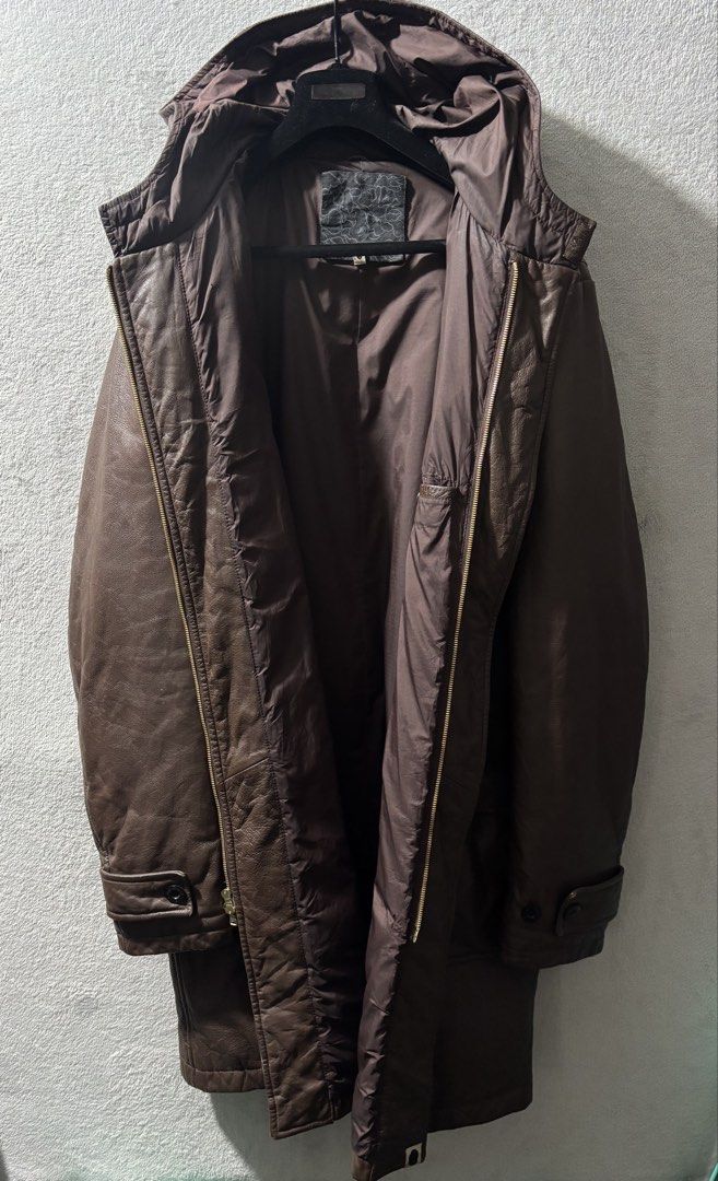 2000s Nigo Era Bape Leather Duffle Coat (Category: Coats, Jackets and Outerwear) located in Baguio. Submitted by thecollector2600 (Listing ID 1458813418, Image 2). Description: Originating from the prime Nigo era of the early 2000s, this heavyweight duffle coat exemplifies A Bathing Ape’s elevated luxury streetwear output under Nowhere Co., Ltd. Constructed from supple full-grain brown cowhide, the garment integrates traditional outerwear element