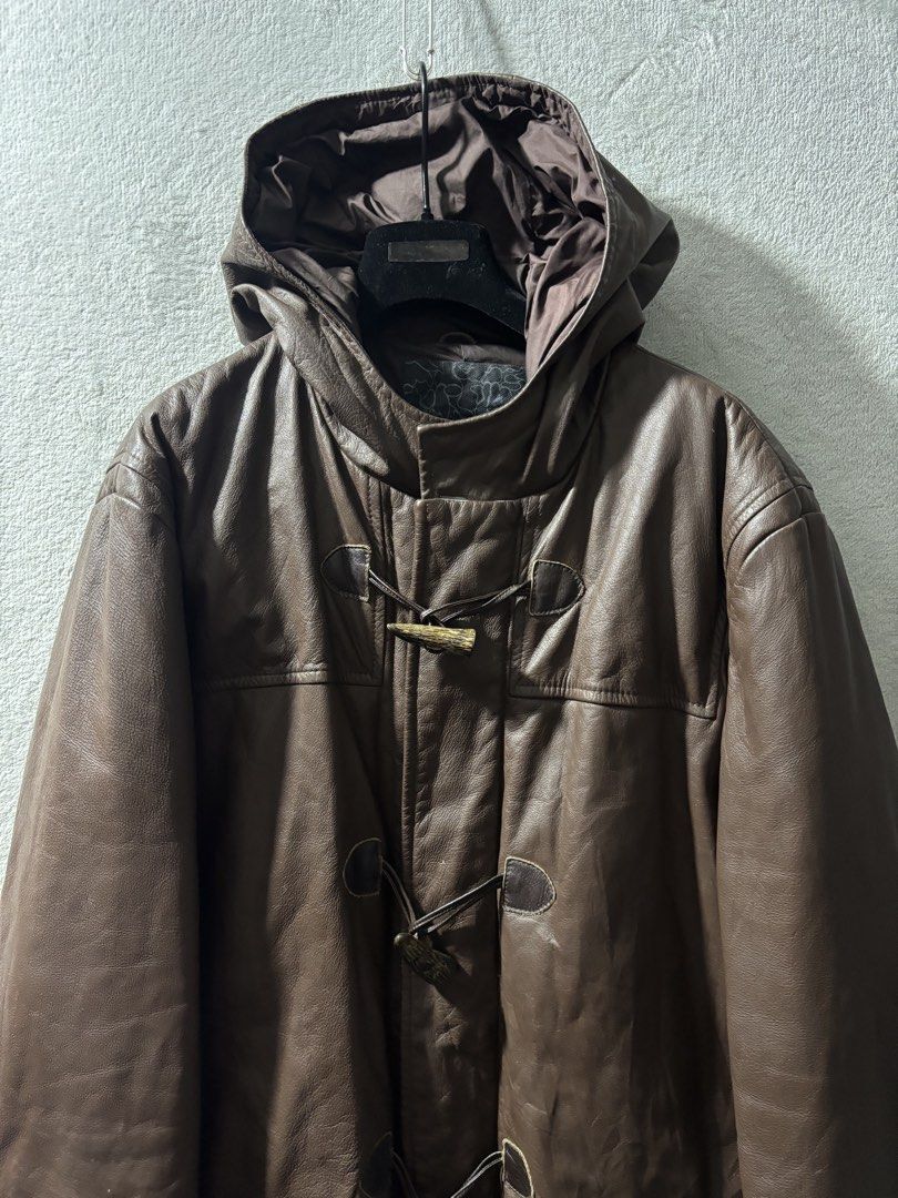 2000s Nigo Era Bape Leather Duffle Coat (Category: Coats, Jackets and Outerwear) located in Baguio. Submitted by thecollector2600 (Listing ID 1458813418, Image 3). Description: Originating from the prime Nigo era of the early 2000s, this heavyweight duffle coat exemplifies A Bathing Ape’s elevated luxury streetwear output under Nowhere Co., Ltd. Constructed from supple full-grain brown cowhide, the garment integrates traditional outerwear element
