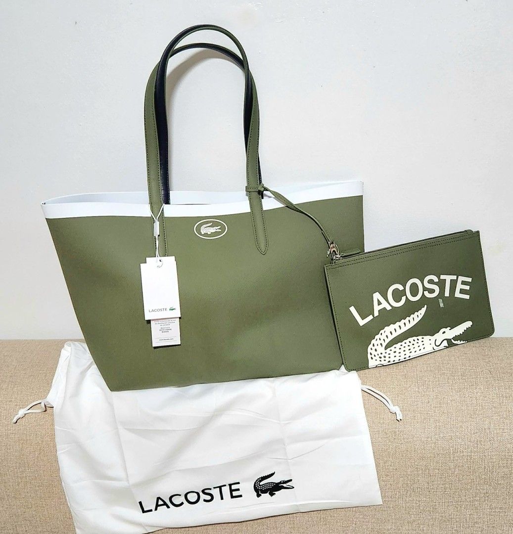 2 IN 1 LACOSTE ANNA REVERSIBLE TOTE (Category: Luxury Bags & Wallets) located in Dasmarinas. Submitted by m3lbern9s (Listing ID 1458806954, Image 1). Description: 👜 Lacoste Anna Reversible Tote 💚 Olive Green + 🤍 White — 2 looks in 1! 🇺🇸 Brand New, sourced from the USA ✔️ Reversible design ✔️ Detachable zippered pouch ✔️ Signature embossed Petit Piqué canvas ✔️ Comes with Lacoste dust bag Elegant, practical & perfect for everyday use! 💚.