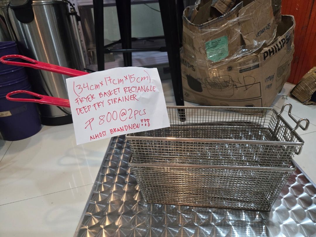 2pcs Rectangle Deep Fryer Basket Strainer (Category: Other Kitchenware & Tableware) located in Makati City. Submitted by maggayj98 (Listing ID 1458810740, Image 1). Description: - Set of 2 rectangular deep fryer baskets - Dimensions: 34cm (L) x 17cm (W) x 15cm (H) - Ideal for straining and draining fried foods - Condition: Almost brand new - Price: For the pair.