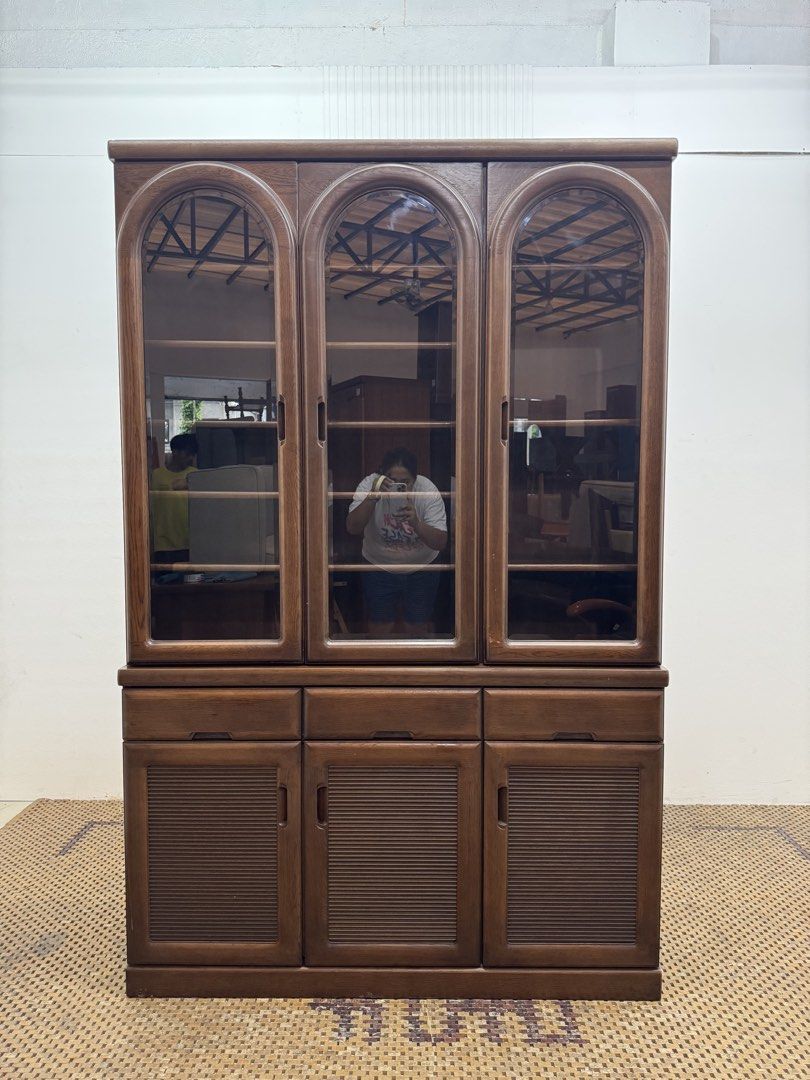 3 door display cabinet (Category: Shelves, Cabinets & Racks) located in Quezon City. Submitted by matetdevis13 (Listing ID 1458801296, Image 1). Description: Vintage Walnut 3-Door Display Cabinet with Drawers & Storage Price: 10,900 L50 x W17 x H78 In good condition Code JMD45-M102.