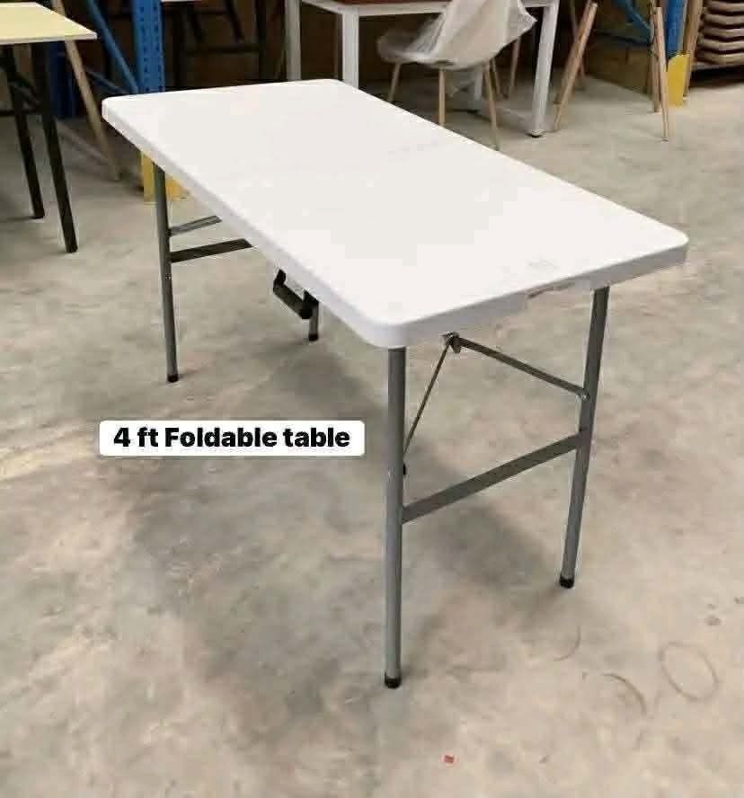 4ft Foldable Table - White Plastic Top, Metal Legs (Category: Tables & Sets) located in Manila. Submitted by tayson_earth (Listing ID 1458885951, Image 1). Description: - 4ft foldable table - White plastic top with sturdy metal legs - Folds flat for easy storage and transport - Ideal for events, parties, or extra workspace - Multiple units available - Approximately 4 feet long.