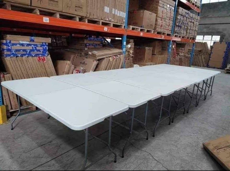 4ft Foldable Table - White Plastic Top, Metal Legs (Category: Tables & Sets) located in Manila. Submitted by tayson_earth (Listing ID 1458885951, Image 2). Description: - 4ft foldable table - White plastic top with sturdy metal legs - Folds flat for easy storage and transport - Ideal for events, parties, or extra workspace - Multiple units available - Approximately 4 feet long.