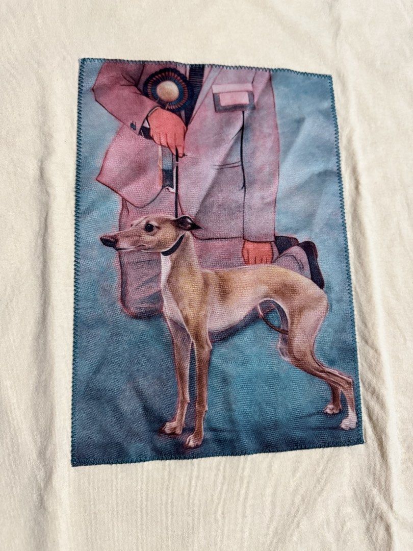 Acne Studios Graphic Print T-Shirt (Category: Tshirts & Polo Shirts ) located in Quezon City. Submitted by domsselections2 (Listing ID 1458746287, Image 2). Description: - Brand: Acne Studios - Color: Light Beige - Design: Unique graphic print on front (dog & person) - Print Style: Vintage art - Material: 100% Cotton - Occasion: Casual wear Dimes: 22x29” Color rate: 9.5/10 Excellent condition Price: 1000php.