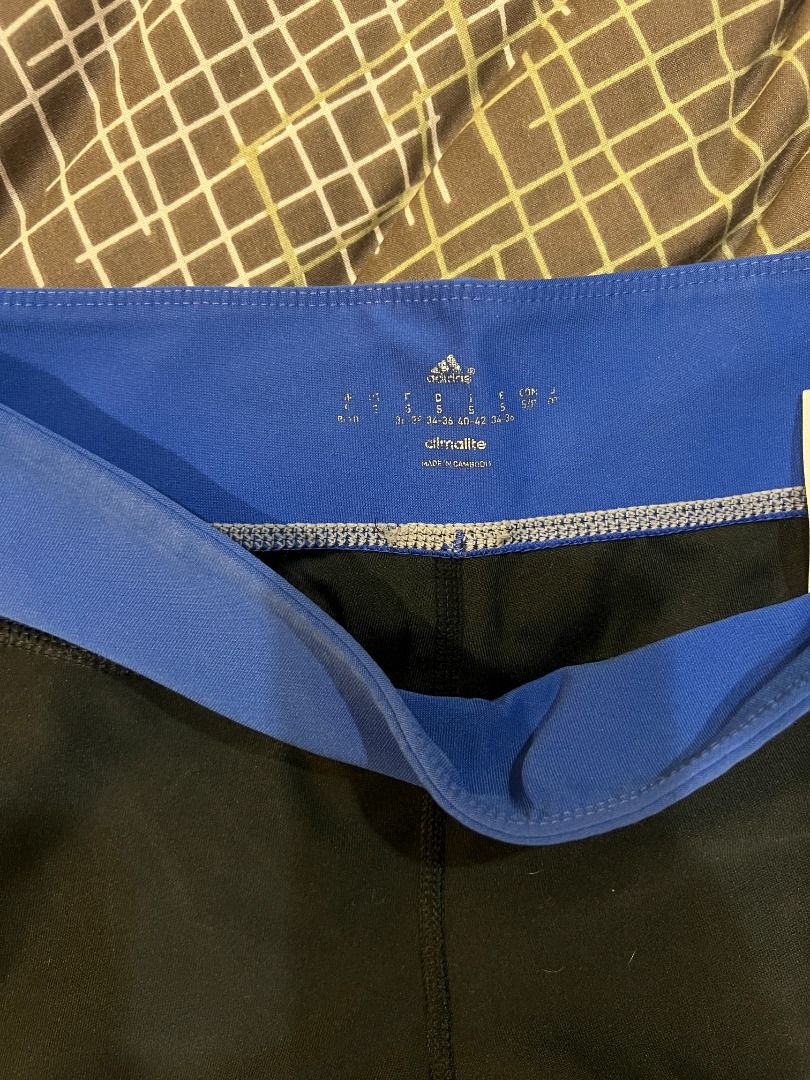 Adidas Climalite Leggings Blue Black (Category: Activewear) located in Paranaque City. Submitted by cute.things.only (Listing ID 1458736207, Image 2). Description: - Black Adidas leggings - Blue waistband - Comfortable and stretchy material - Adidas Climalite technology for moisture management - Ideal for running, gym sessions, or casual wear - Has a small pocket on the waistband -- perfect for a key or some coins.