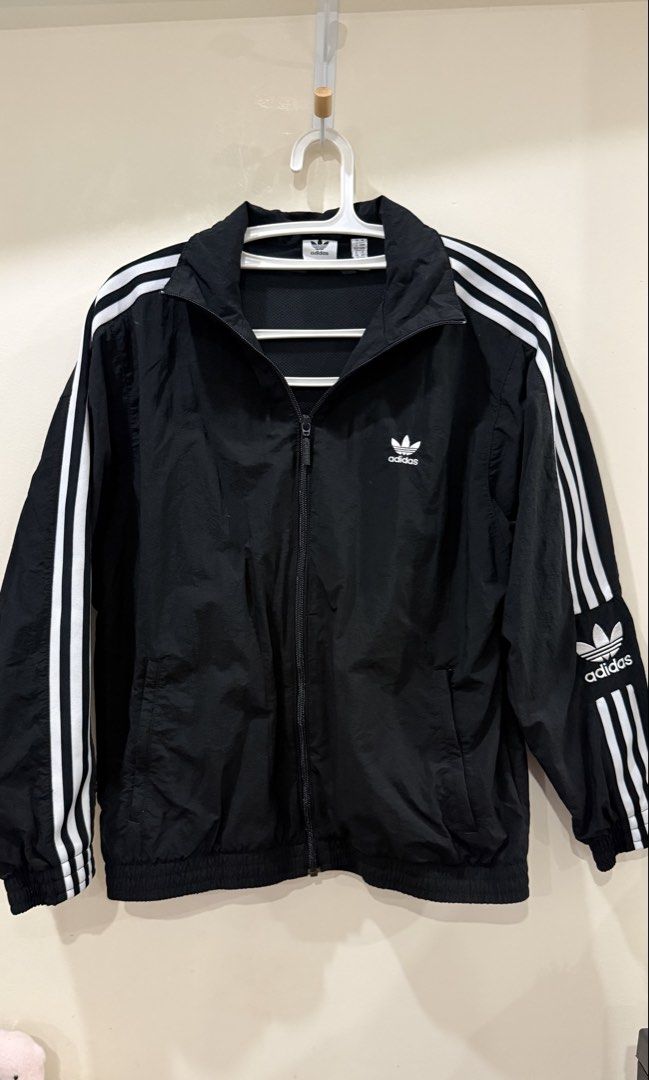 Adidas Lockup TT Black Track Jacket - M (Category: Coats, Jackets and Outerwear) located in Paranaque City. Submitted by the_spoiled_closet (Listing ID 1458753178, Image 1). Description: Decluttering my spoiled closet 🤍 ✨ I have way too many stuffs and this beauty deserves to be used more instead of sitting pretty in my collection. ✨Well-loved & well-kept luxury finds. ✨ All items are guaranteed authentic. Condition: - Washed once only, then sto