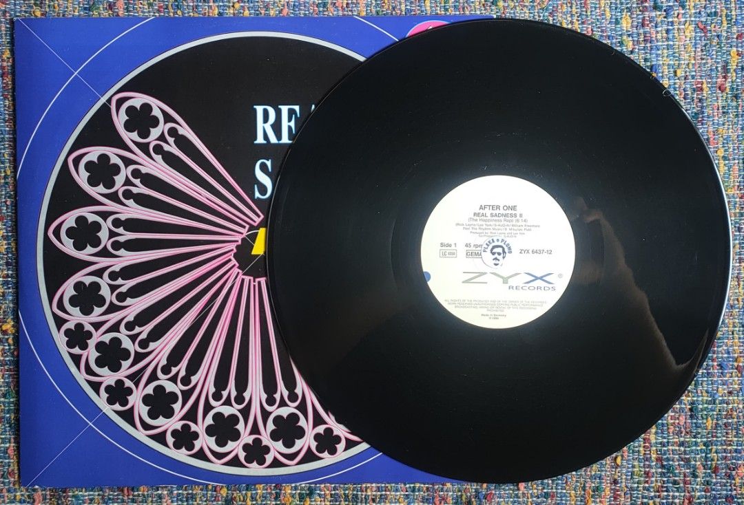 After One - Real Sadness II 12" Vinyl Record (Category: Vinyls) located in Quezon City. Submitted by plaka.o.plomo (Listing ID 1458758336, Image 3). Description: Artist(s) : After One Song(s) : Real Sadness II / Let's Get Together Year : 1990 Media : VG+ Color : Black Sleeve : VG+ No. : 1x Vinyl Size : 12" RPM : 45 Country : Germany Catalog No. : ZYX 6437-12 Tracklist : - Side 1 1. Real Sadness II (The Happiness Rap) 6:14 - Side 2 1. Let's Get To