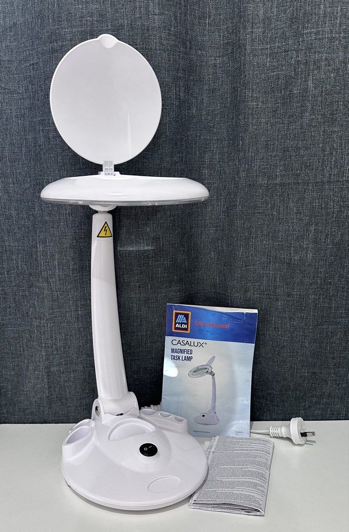 Aldi Casalux Magnified Task Lamp with LED Light (Category: Lighting) located in Quezon City. Submitted by flying_mom (Listing ID 1458694041, Image 2). Description: - Aldi Casalux Magnified Task Lamp - Features an LED light ring around the magnifying glass - Adjustable lamp arm for optimal positioning - Comes with the user manual - Includes plug for immediate use - Ideal for detailed work, crafts, hobbies, and more.