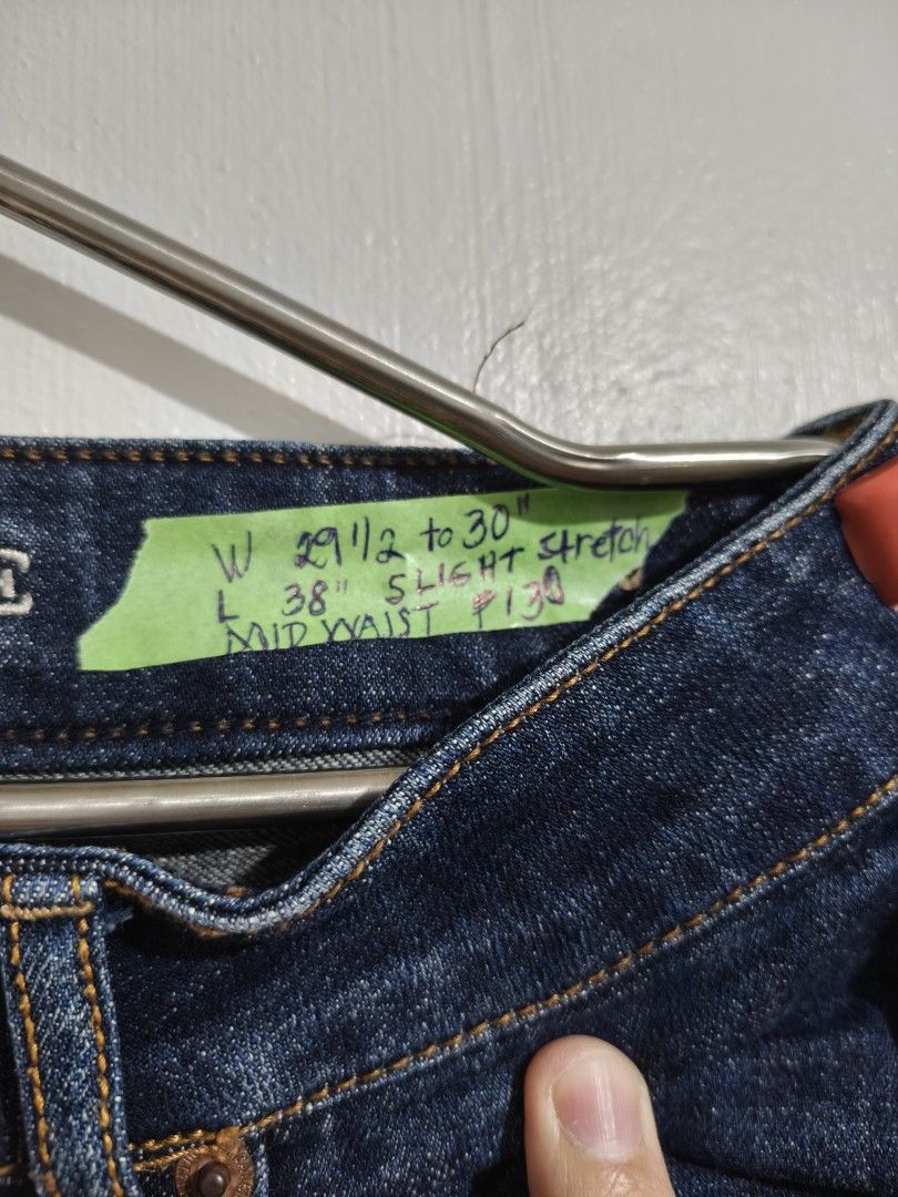 American Eagle Outfitters Jeans (Category: Jeans) located in Manila. Submitted by bmsthrift (Listing ID 1458761300, Image 2). Description: - Brand: American Eagle Outfitters - Color: Dark Wash Denim - Size: Waist 29-30 inches, Length 38 inches - Fit: Mid-waist - Features: Slight stretch for comfort, Frayed hem detail.