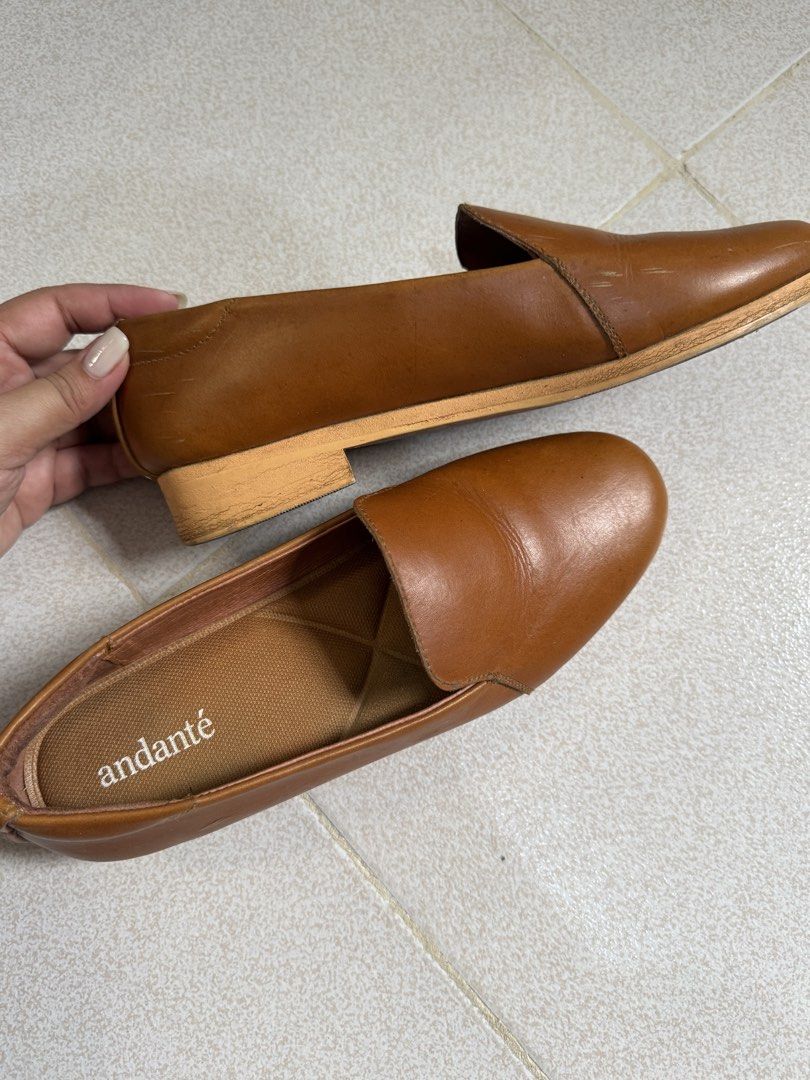 Andante Brown Leather Loafers (Category: Loafers) located in Pasay City. Submitted by margucci_0823 (Listing ID 1458750768, Image 2). Description: - Brand: Andante - Style: Brown Leather Loafers (Slip-on) - Features: Comfortable cushioned insole - Condition: Soles show some wear - Best fits size 7 (narrow feet); 6-6.5 if planning to wear with thick socks - Orig price: ₱2,072 RFS: it’s too small for me. I’m a size 8 but when I use it I remove the 