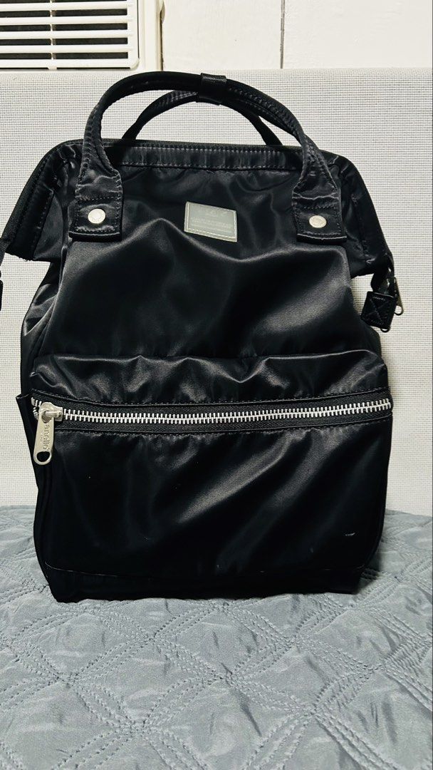 Anello Backpack Black Nylon (Category: Backpacks) located in Quezon City. Submitted by halfofit (Listing ID 1458863264, Image 1). Description: - Stylish black Anello backpack - Durable nylon material - Convenient front zipper pocket - Spacious main compartment - Comfortable padded shoulder straps - Versatile: wear as a backpack or carry by top handles - Ideal for daily use and travel.