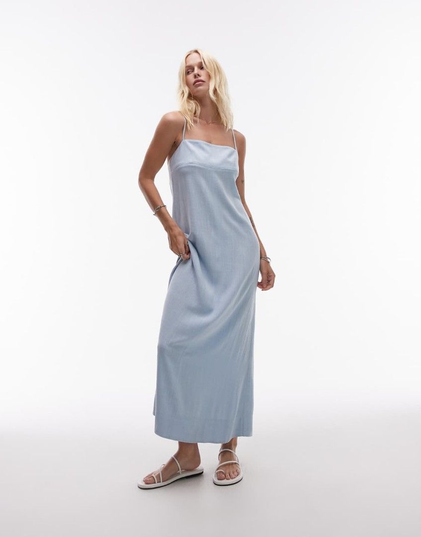 Anko Light Blue Spaghetti Strap Maxi Dress (Category: Dresses) located in Bacoor. Submitted by Miss_Chuch0521 (Listing ID 1458840291, Image 1). Description: - Light blue maxi dress - Spaghetti straps - Cowl neckline - Flowy material - Versatile: great for events or casual days - Easy to style up or down - Flattering fit.