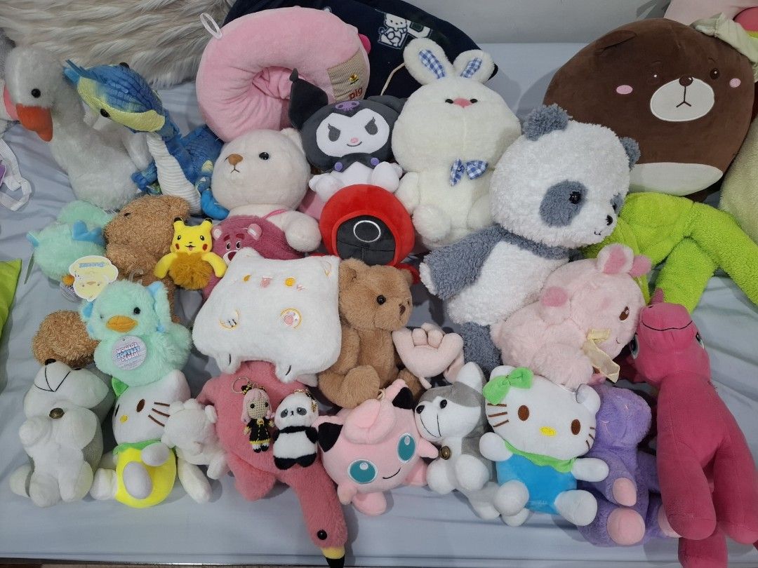 Assorted Plush Toys -23 Cute Stuffed Animals Collection (Category: Plushies & Soft Toys) located in Quezon City. Submitted by quickmountain_b45748 (Listing ID 1458693237, Image 1). Description: - Adorable plushies available! - Featuring popular characters like Pandas, Bears, Kitty, and Pikachu. - Comes in a variety of sizes, from small to big. - Ideal for collectors or as a thoughtful gift. - All plushies are clean and well-maintained. - Ready to