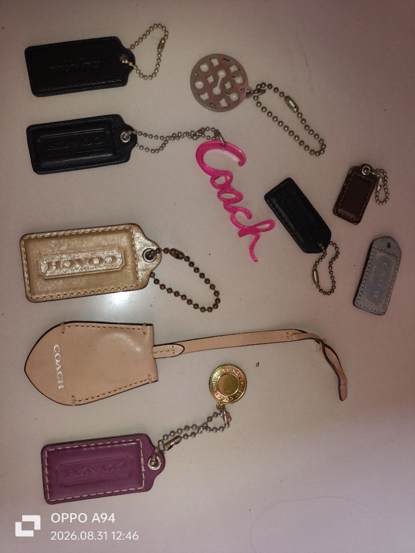 Authentic Coach Bag Charms - Assorted Styles (Category: Charms) located in Batangas. Submitted by ponylittle37795 (Listing ID 1458727018, Image 2). Description: - Genuine Coach bag charms - Available in black, tan, purple, and grey - Some feature embossed Coach logo - Perfect for personalizing handbags - Great gift idea - Authentic Coach accessories.