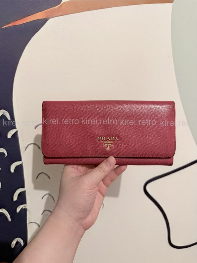 AUTHENTIC Prada Saffiano Pink Wallet (Category: Luxury Bags & Wallets) located in Taguig. Submitted by kirei.retro (Listing ID 1458810804, Image 1). Description: Comes with card only .