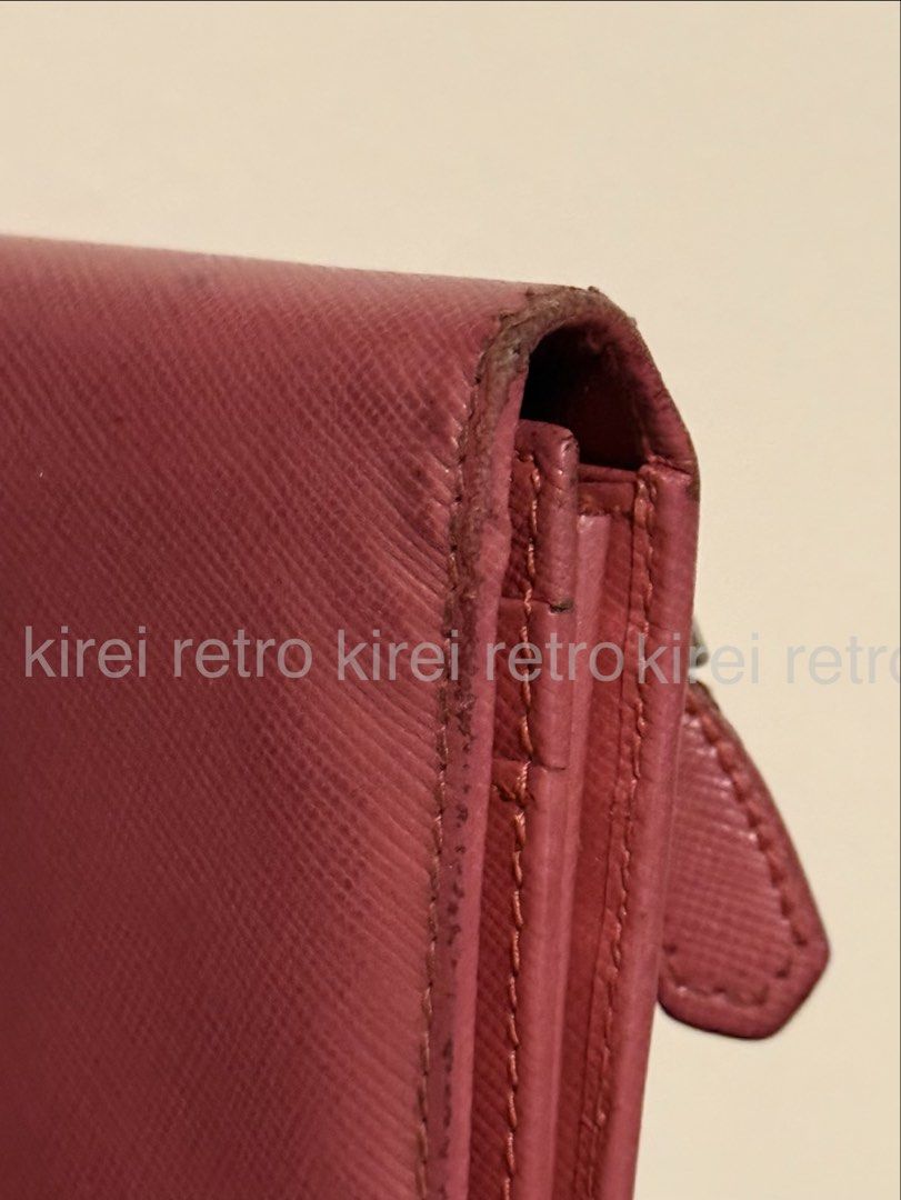 AUTHENTIC Prada Saffiano Pink Wallet (Category: Luxury Bags & Wallets) located in Taguig. Submitted by kirei.retro (Listing ID 1458810804, Image 3). Description: Comes with card only .