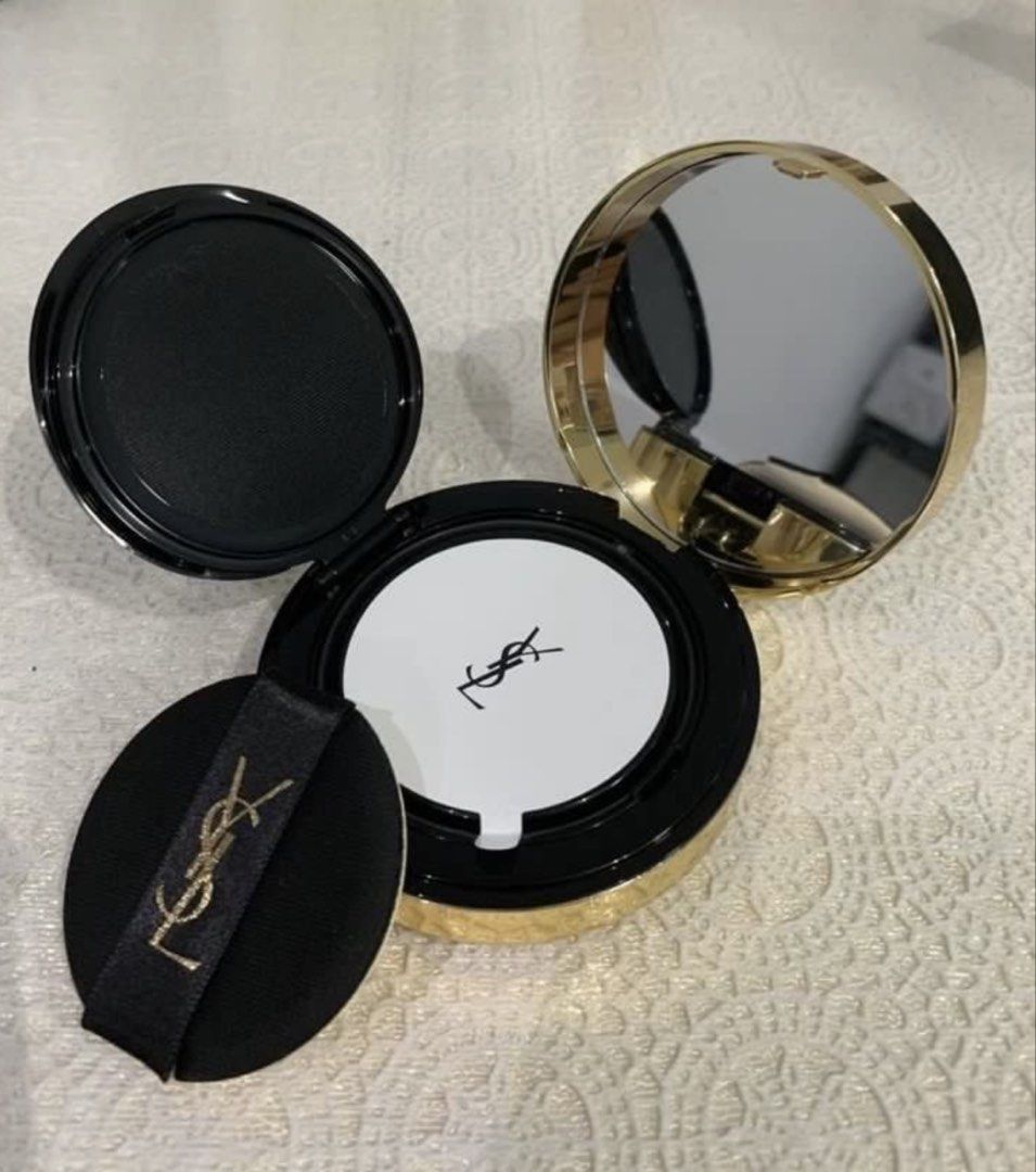 Authentic YSL Gold Rush Trio Highlighter Cushion (Category: Makeup) located in Mandaluyong City. Submitted by lgariba (Listing ID 1458744511, Image 2). Description: - YSL Gold Rush Trio Highlighter Cushion - Luminous highlighter, Collector's Edition - Comes with applicator puff - Elegant gold casing with white and gold cracked pattern design - Perfect for achieving a radiant glow - No more box.