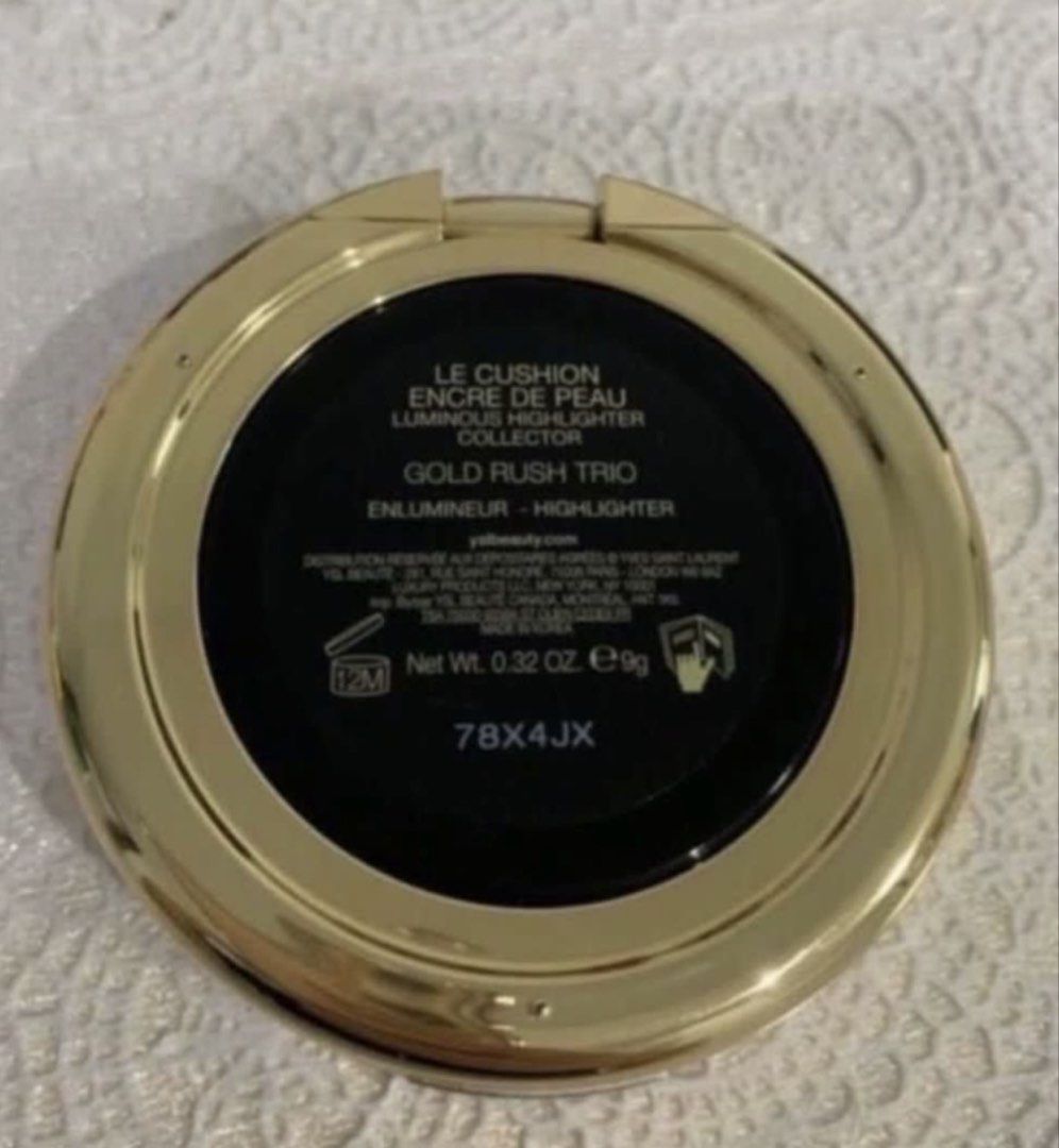 Authentic YSL Gold Rush Trio Highlighter Cushion (Category: Makeup) located in Mandaluyong City. Submitted by lgariba (Listing ID 1458744511, Image 3). Description: - YSL Gold Rush Trio Highlighter Cushion - Luminous highlighter, Collector's Edition - Comes with applicator puff - Elegant gold casing with white and gold cracked pattern design - Perfect for achieving a radiant glow - No more box.