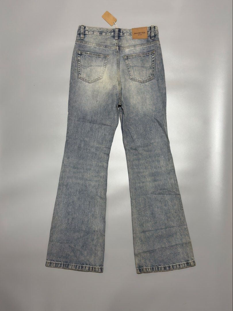 BALENCIAGA LOST TAPE FLARED JEANS (Category: Luxury Apparel) located in Alburquerque. Submitted by getniceph2022 (Listing ID 1458744590, Image 1). Description: BALENCIAGA LOST TAPE FLARED JEANS - SIZE XS WAISTLINE: 30-31 LENGTH: 45 KNEE: 9 LEG HOLE: 11.