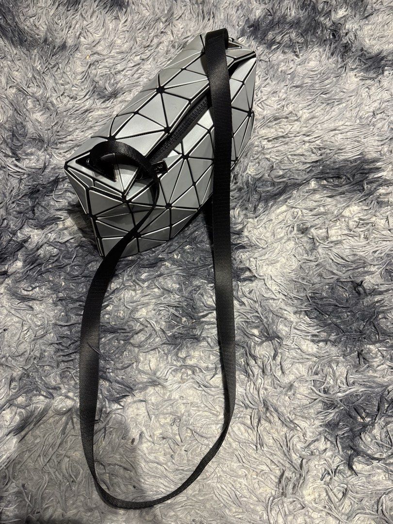 Baobao G (Category: Luxury Bags & Wallets) located in Legazpi City. Submitted by thesource052 (Listing ID 1458858835, Image 2). Description: Issey Miyake Baobao Symetrical Crossbody bag Width: 12” Length:6” Excellent to new condition Slight gasgas lng sobrang. Liit No issues.