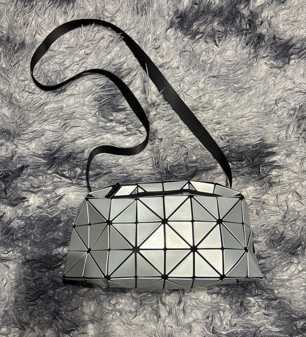 Baobao G (Category: Luxury Bags & Wallets) located in Legazpi City. Submitted by thesource052 (Listing ID 1458858835, Image 1). Description: Issey Miyake Baobao Symetrical Crossbody bag Width: 12” Length:6” Excellent to new condition Slight gasgas lng sobrang. Liit No issues.
