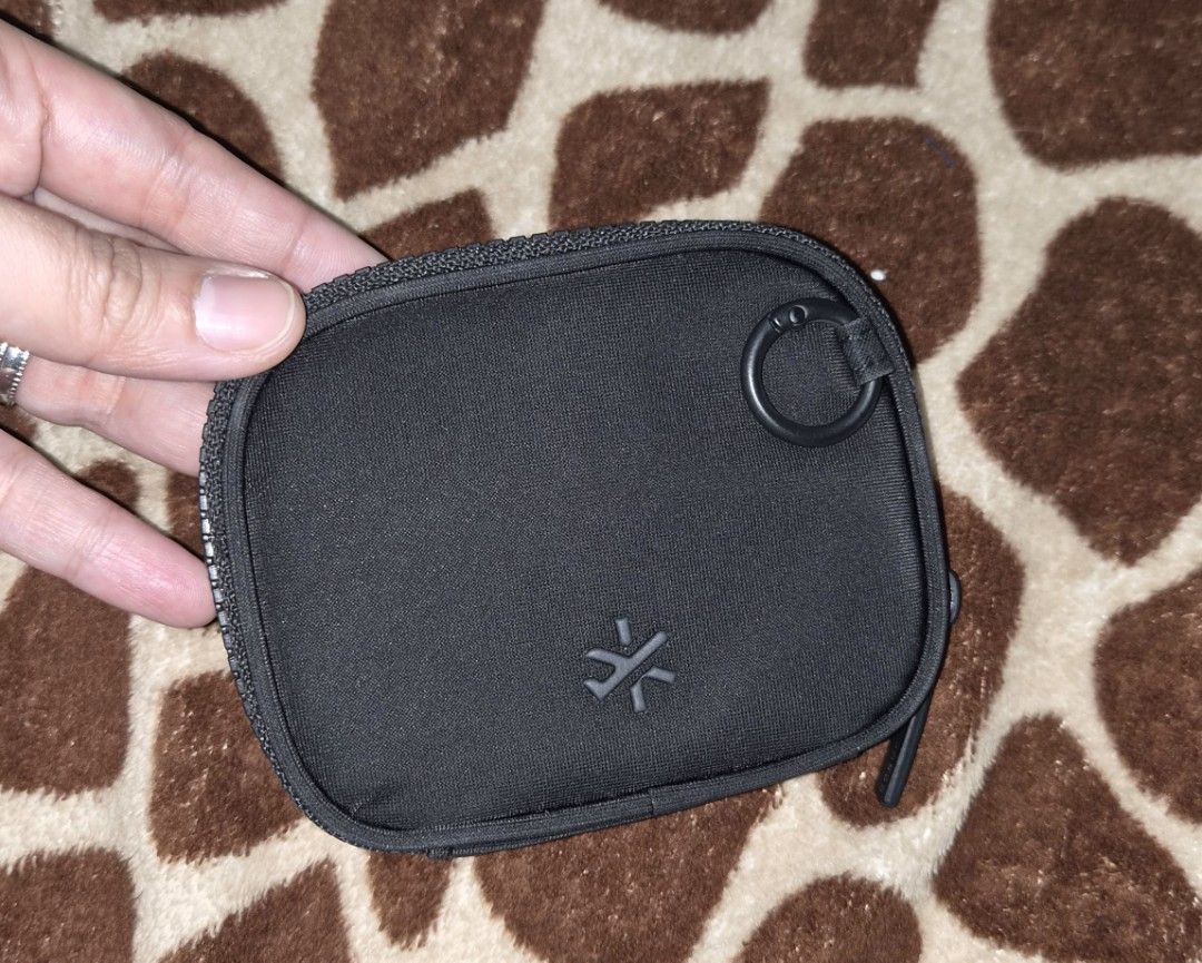 BASH Black Coin Pouch with Zipper and Detachable Strap (Category: Purses & Pouches) located in Pasig City. Submitted by bash0011 (Listing ID 1458781156, Image 3). Description: - Brand: BASH - Color: Black - Main compartment with zipper - Inner pocket - Front slip pocket - Detachable ring for easy carrying - Ideal for coins, cards, and small essentials.