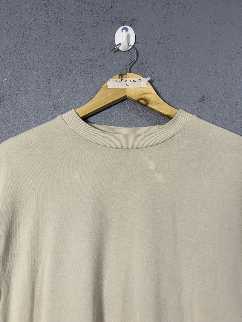 Beige T-shirt Size L (Category: Others Tops) located in Famy. Submitted by basicthrifted (Listing ID 1458723365, Image 2). Description: - Basic beige t-shirt - Rolled sleeves - Size: Large (L) - Approximate Measurements: Length 22.5 inches, Width 20.5 inches.