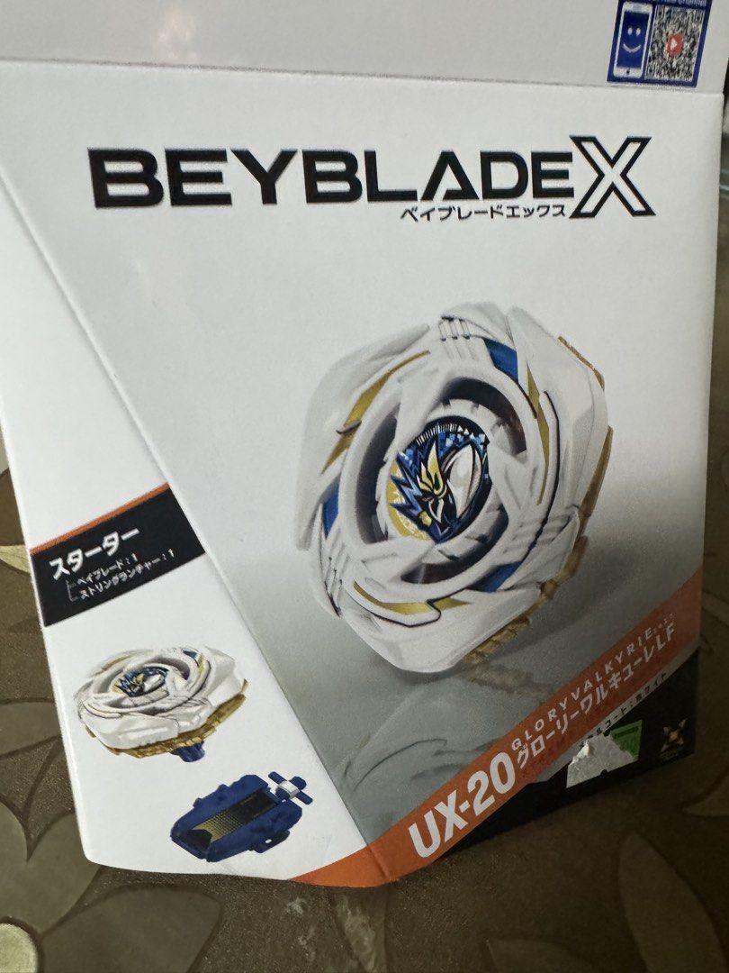 Beyblade X UX-20 爆旋陀螺 附發射器 （分類：動作及對戰玩具）位於 Hong Kong。 由 thonmasse4264o 提交（商品編號 1458712105，圖片 1）。簡介： 呢款係白色同金色嘅配色，好靚。盒入面有埋發射器，買返去就可以即刻玩得。送禮自用都啱。。