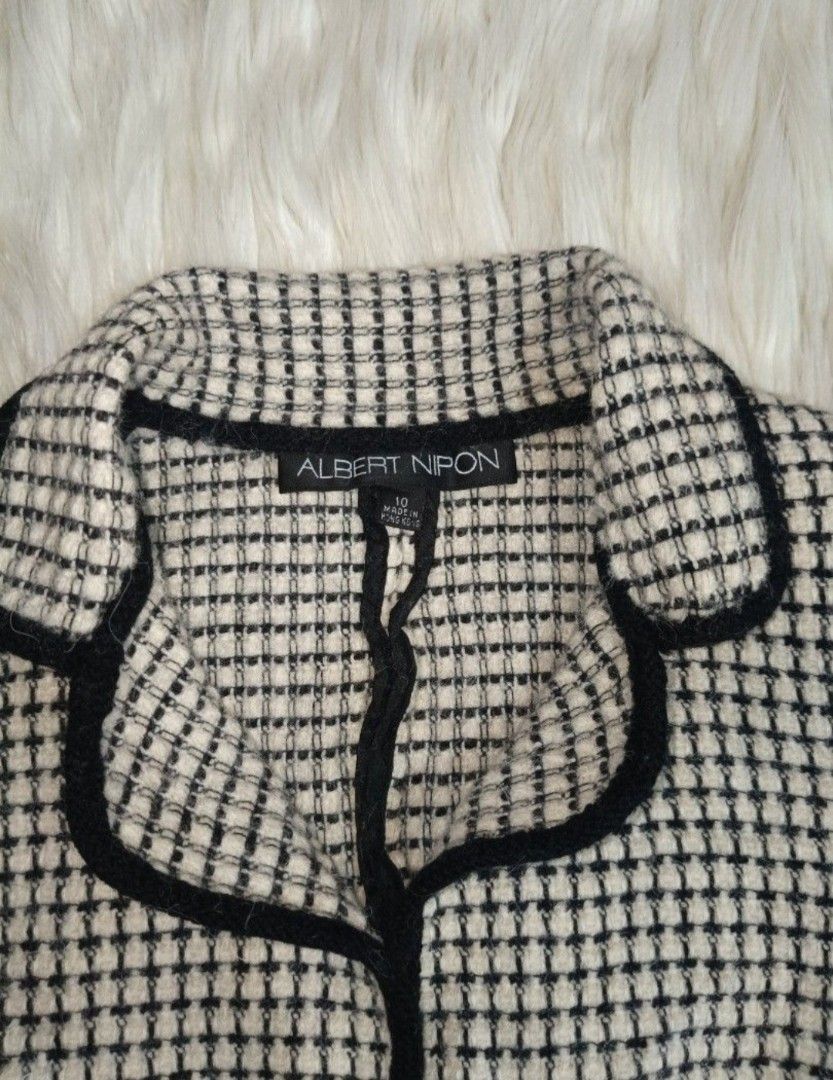Black and White Checked Coat (Category: Coats, Jackets and Outerwear) located in Paranaque City. Submitted by happyheartclosetslove (Listing ID 1458714115, Image 3). Description: 🌸FITS XS-SMALL ✨ 📍can be shipp via jnt or pickup via lalamove 📍 parañaque - Albert Nippon jacket - Classic black and white check pattern - Contrasting black trim on edges and collar - Long sleeves with flared cuffs - Zipper closure down the front - Stylish and great f
