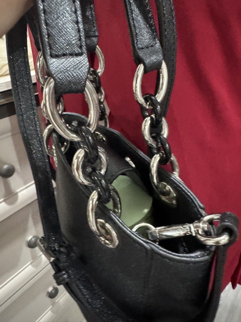 Black Michael Kors Handbag with Silver Hardware (Category: Luxury Bags & Wallets) located in Cauayan City . Submitted by espiritucj (Listing ID 1458849991, Image 2). Description: - Authentic Black Michael Kors Handbag - Elegant Silver Chain Details - Detachable Strap for Versatile Wear - Multiple Interior Compartments for Organization - Subtle Shimmering Material - Ideal for Everyday or Evening Use - Immaculate Condition (Clean Inside and Out) - 