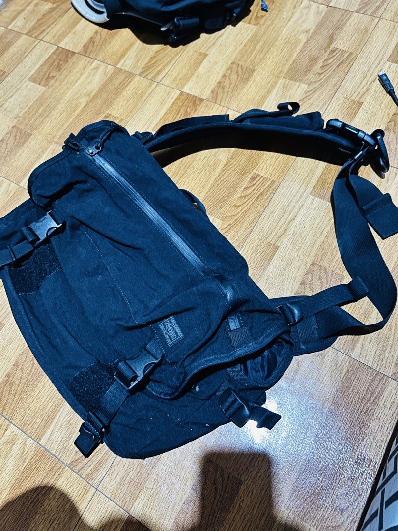Black Porter-Yoshida & Co. Backpack (Category: Backpacks) located in Manila. Submitted by mr.helpmeclean (Listing ID 1458785555, Image 1). Description: - Brand: Porter-Yoshida & Co. - Color: Black - Features: Multiple pockets and straps - Main compartment: Zips open - Comfort: Padded back and shoulder straps - Material: Durable - Ideal for: Everyday use or travel.