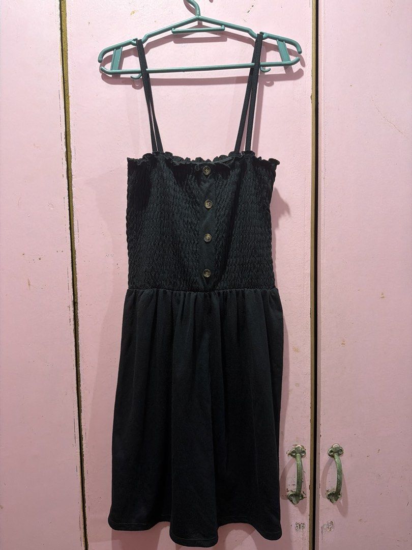 Black Smocked Button-Up Mini Dress with Spaghetti Straps (Category: Dresses) located in Muntinlupa City. Submitted by lybns (Listing ID 1458803495, Image 1). Description: - XS to S - Chic black mini dress - Smocked bodice for a flattering fit .