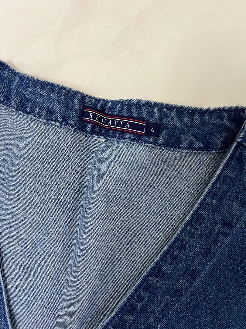 Regatta Vest (Category: Vests) located in Quezon City. Submitted by max.declutter (Listing ID 1458770585, Image 2). Description: Blue denim vest. Button-up front with silver buttons with two front pockets Rfs: too big on me .