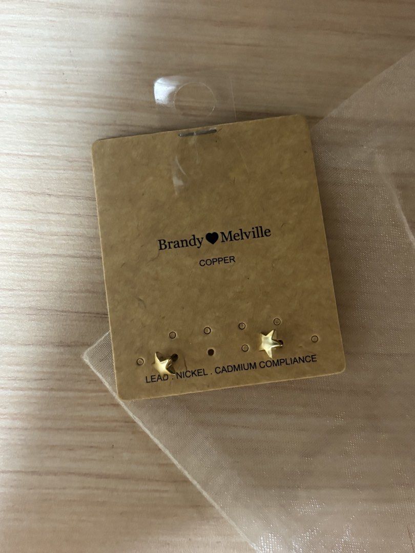 Brandy Melville Copper Star Earrings (Category: Earrings) located in Paranaque City. Submitted by krispykk (Listing ID 1458829965, Image 1). Description: - Brand: Brandy Melville - Design: Cute little star earrings - Color: Copper - Material: Copper - Compliance: Lead, nickel, and cadmium compliant - Condition: Brand new, never worn - Style: Perfect for everyday sparkle.